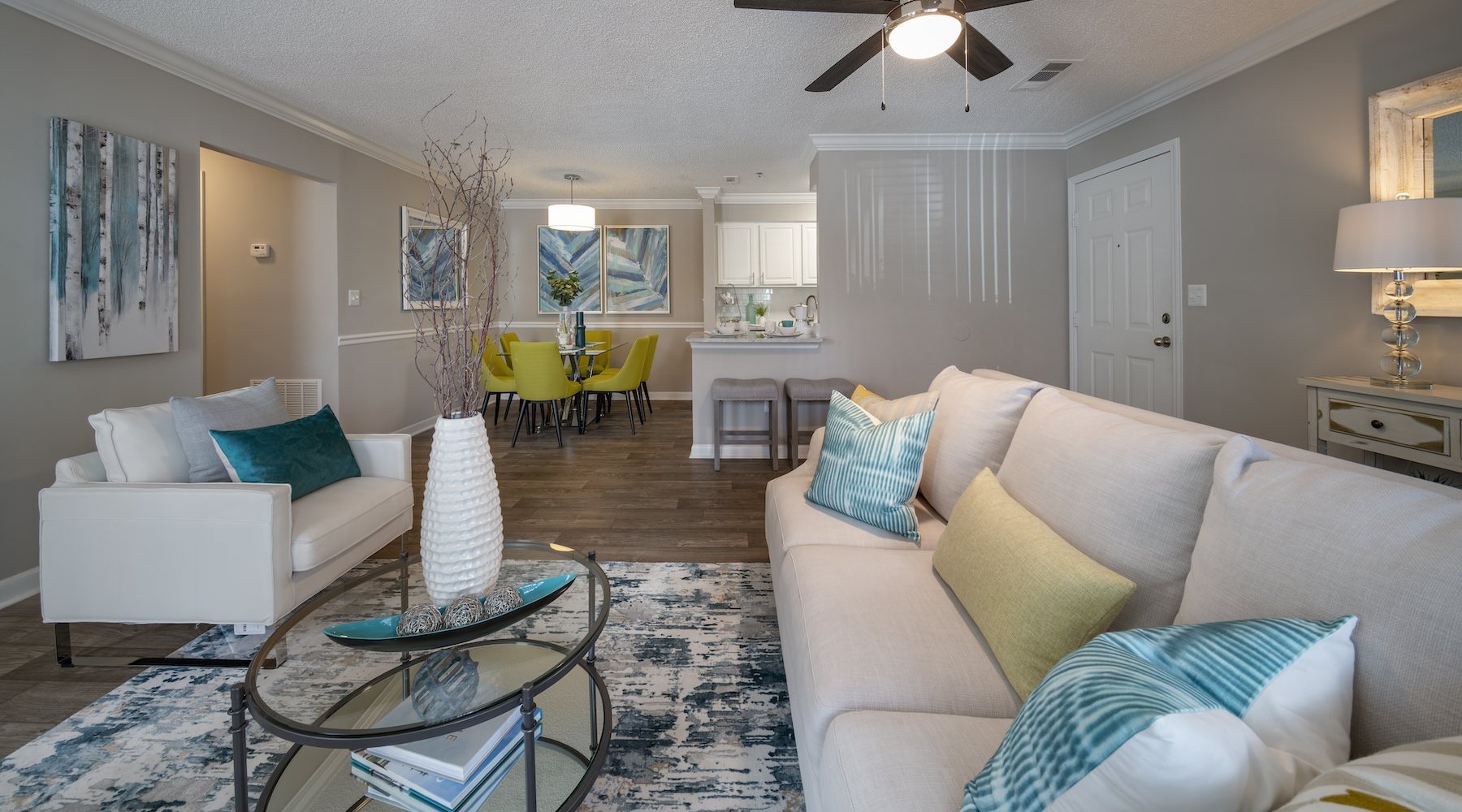 a living room with a couch and a chair